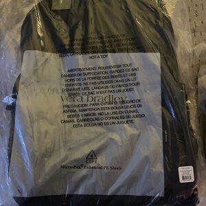 Vera Bradley lunchbox in Moonless Night. Never used it opened. Plastic covering